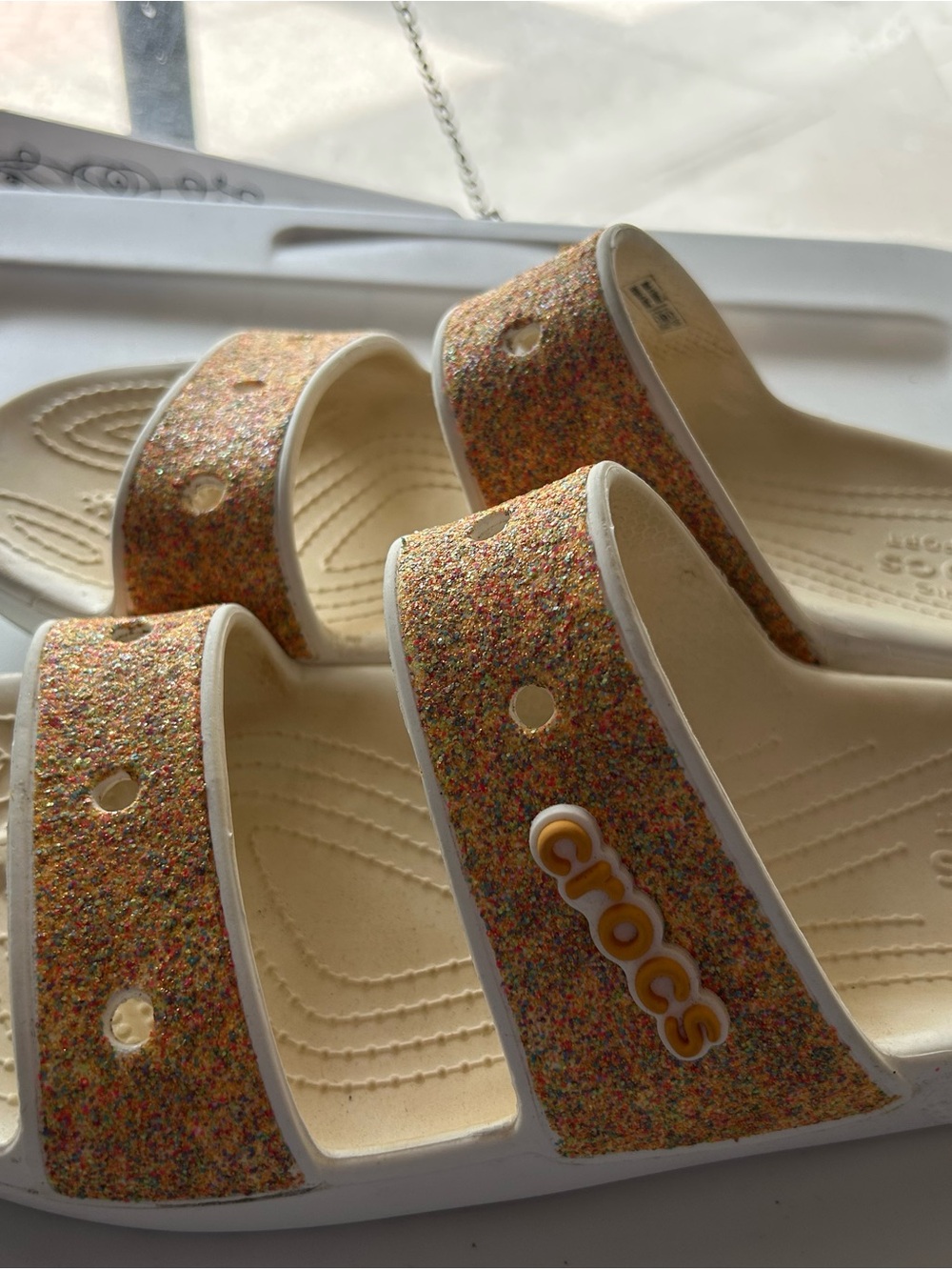 CROCS Cream Slide Sandals with Multicolor Glitter Straps - Picture 2 of 4